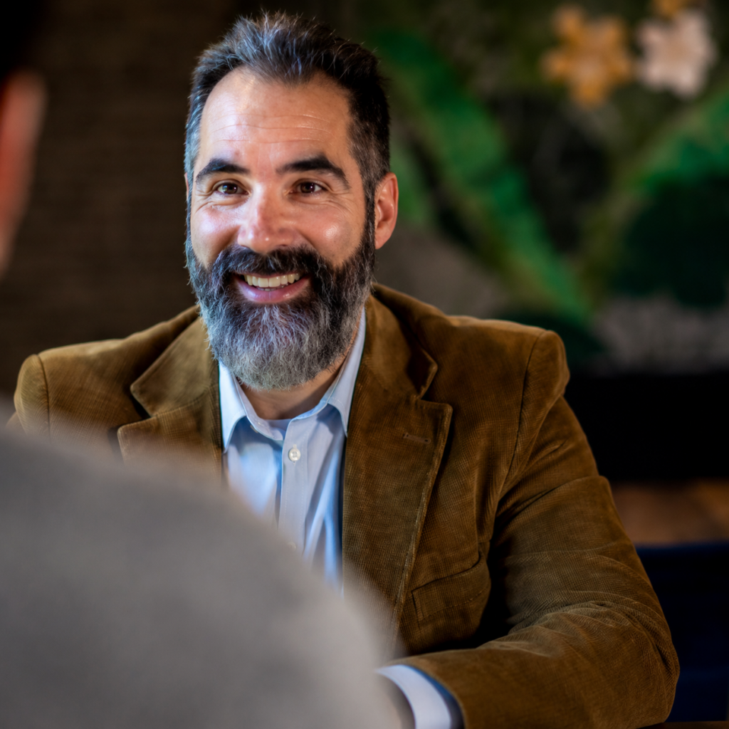 Professional discussing information during a meeting